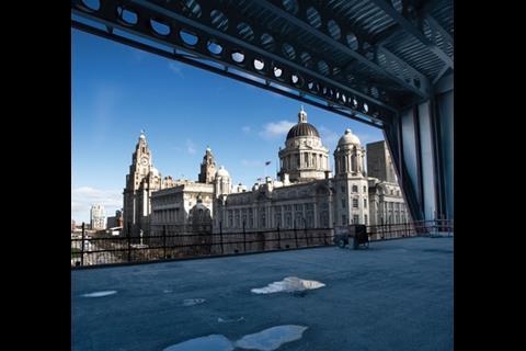 Huge windows offer superb views over the Three Graces and the Mersey on the other side